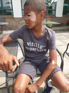 vitiligo superhero Kids Tee